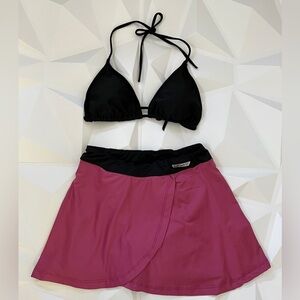 Black Bikini Top and Pink Skort Set
Perfect for beach outings.